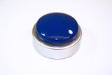 One tap talking clock is a big, round blue button on a silver base. 