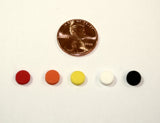 5 individual round, flat, foam bump dots in assorted colors next to a penny. Each bump dot is about 1/6 the size of a penny.