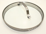 Silver pot lid with clear top and sliver handle with holes on the side for pouring.